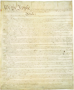 The first page of the U.S. Constitution is shown.